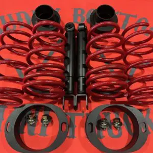 Pair of red coil springs and shocks